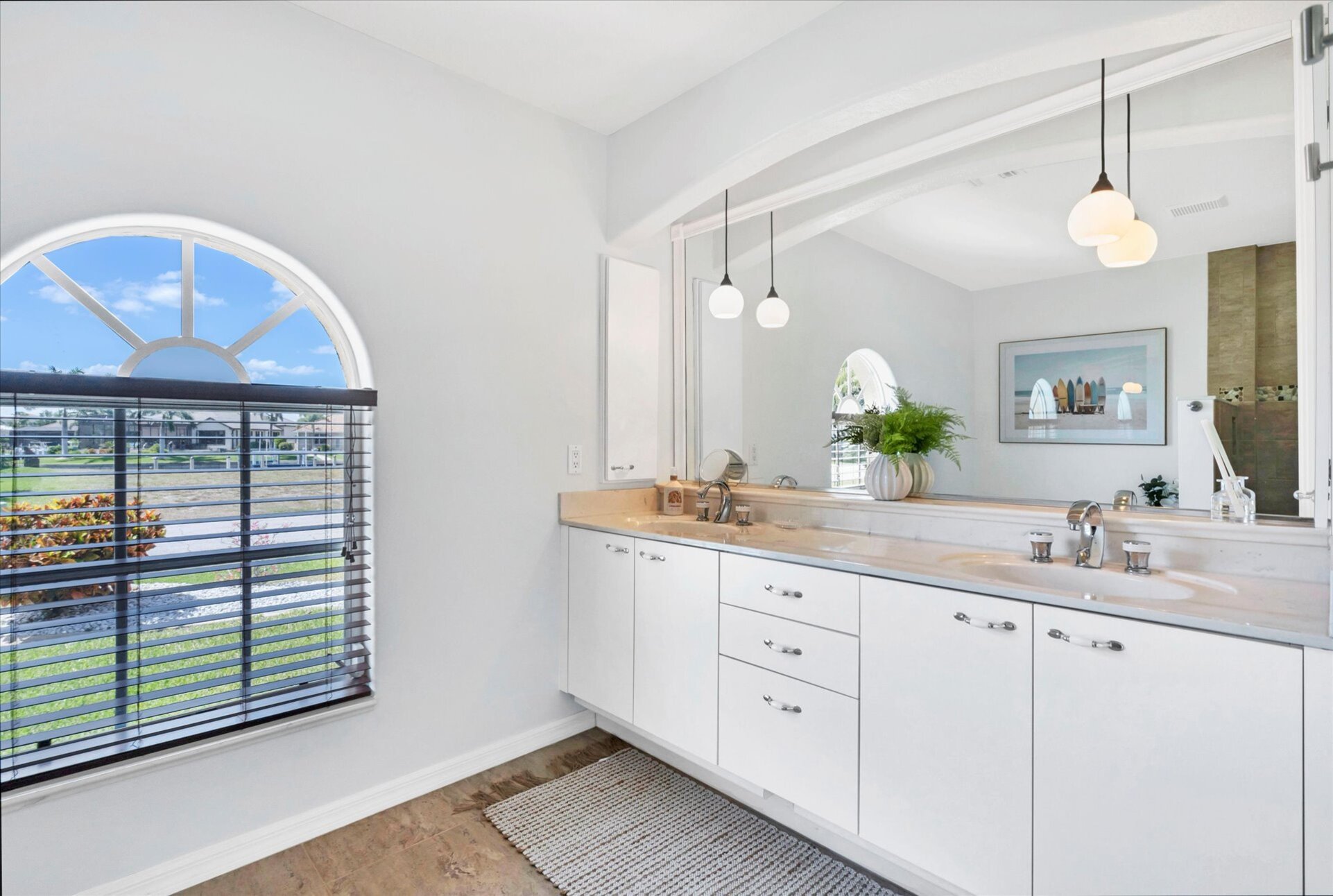 Ensuite features double vanities, walk-in shower and soaking tub