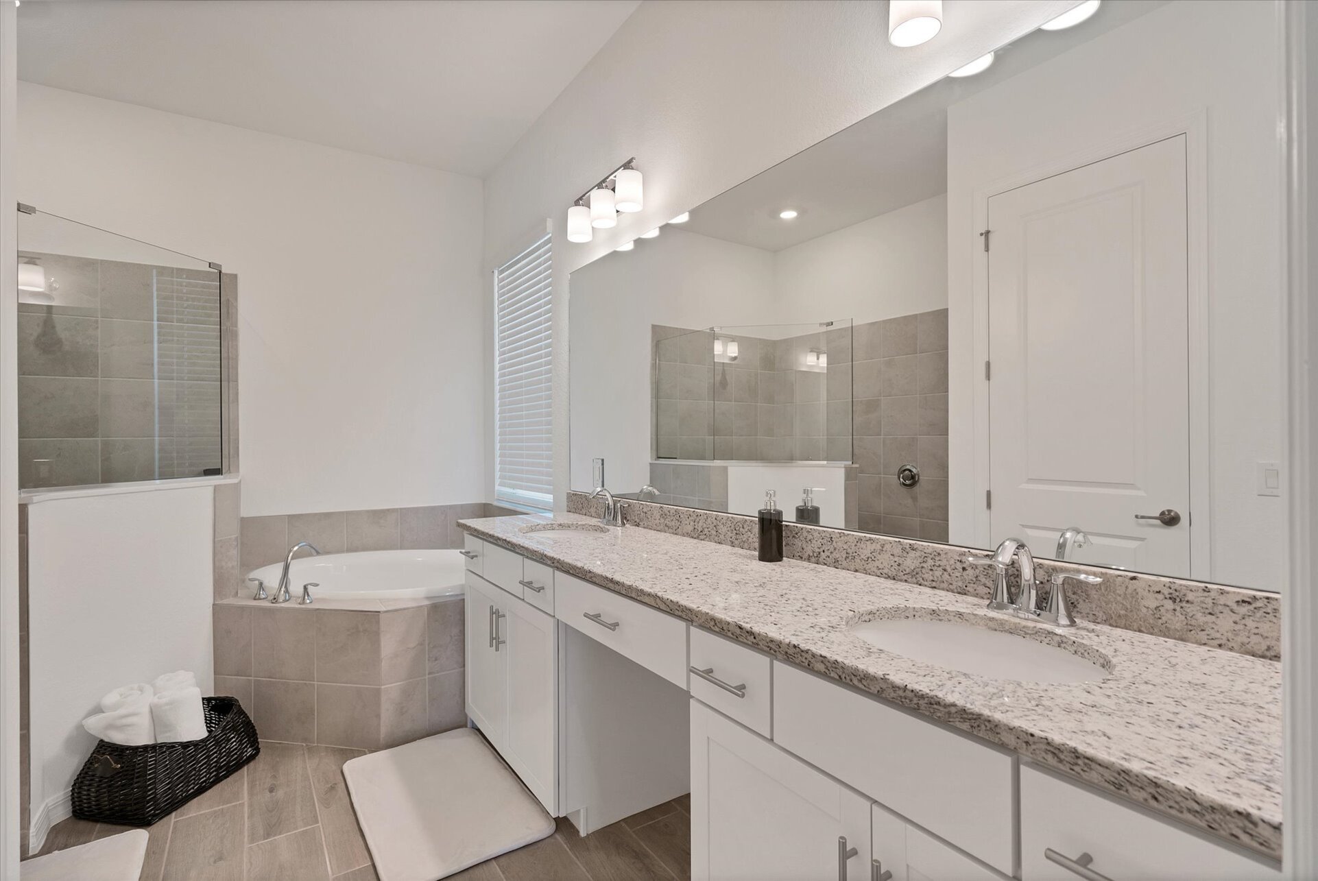 Ensuite features a walk-in shower, soaking tub and double vanities