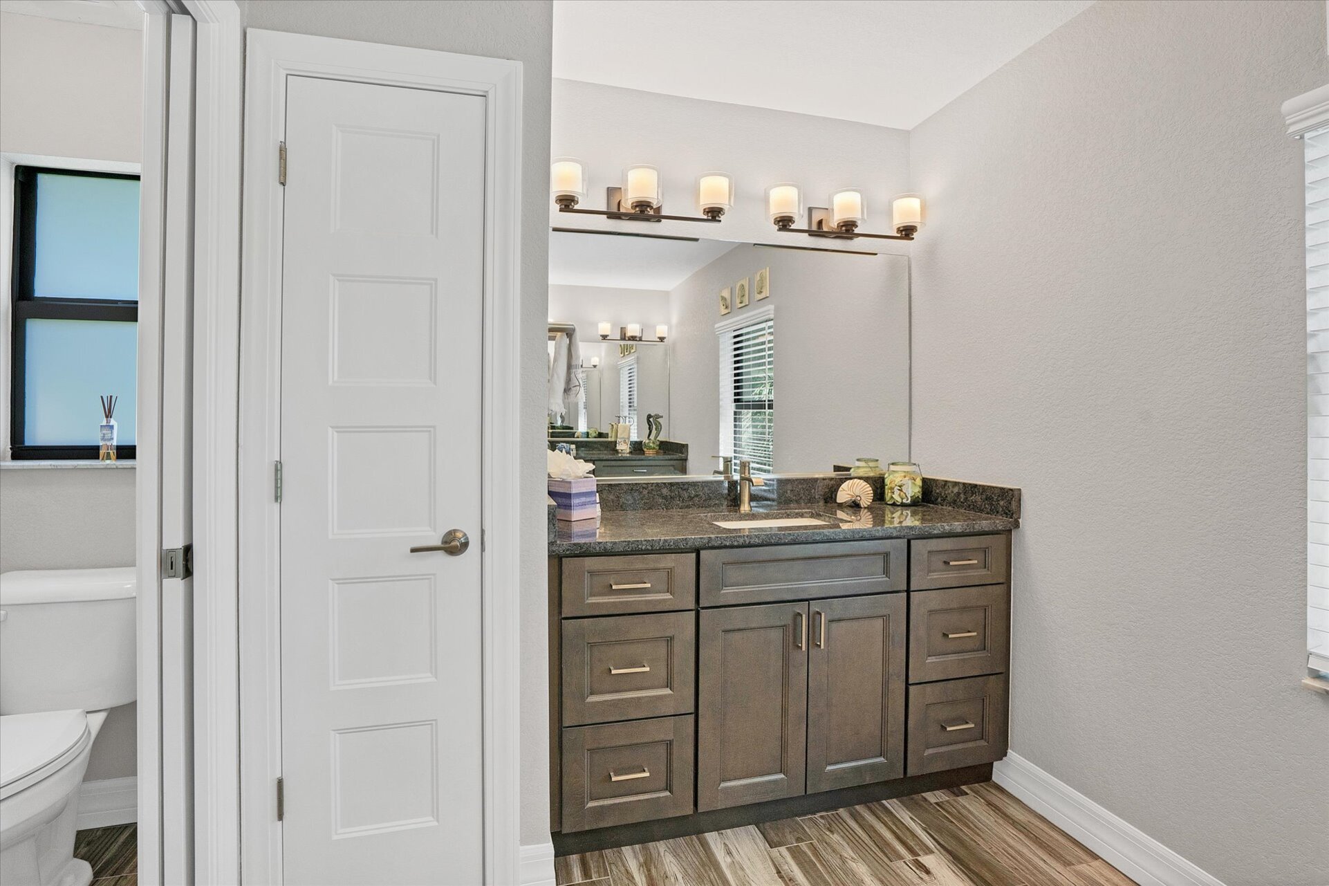 Beautiful primary bathroom with walin shower and double vanities