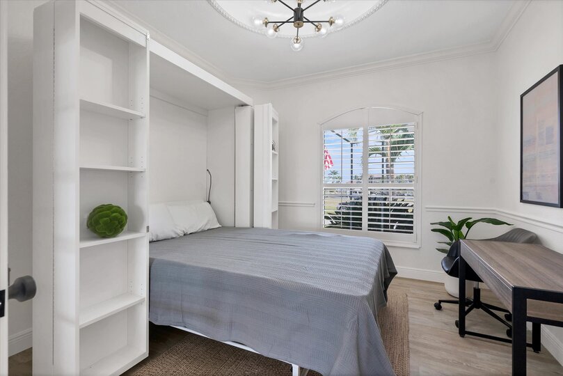Office space has a full size Murphy bed for extra sleeping space