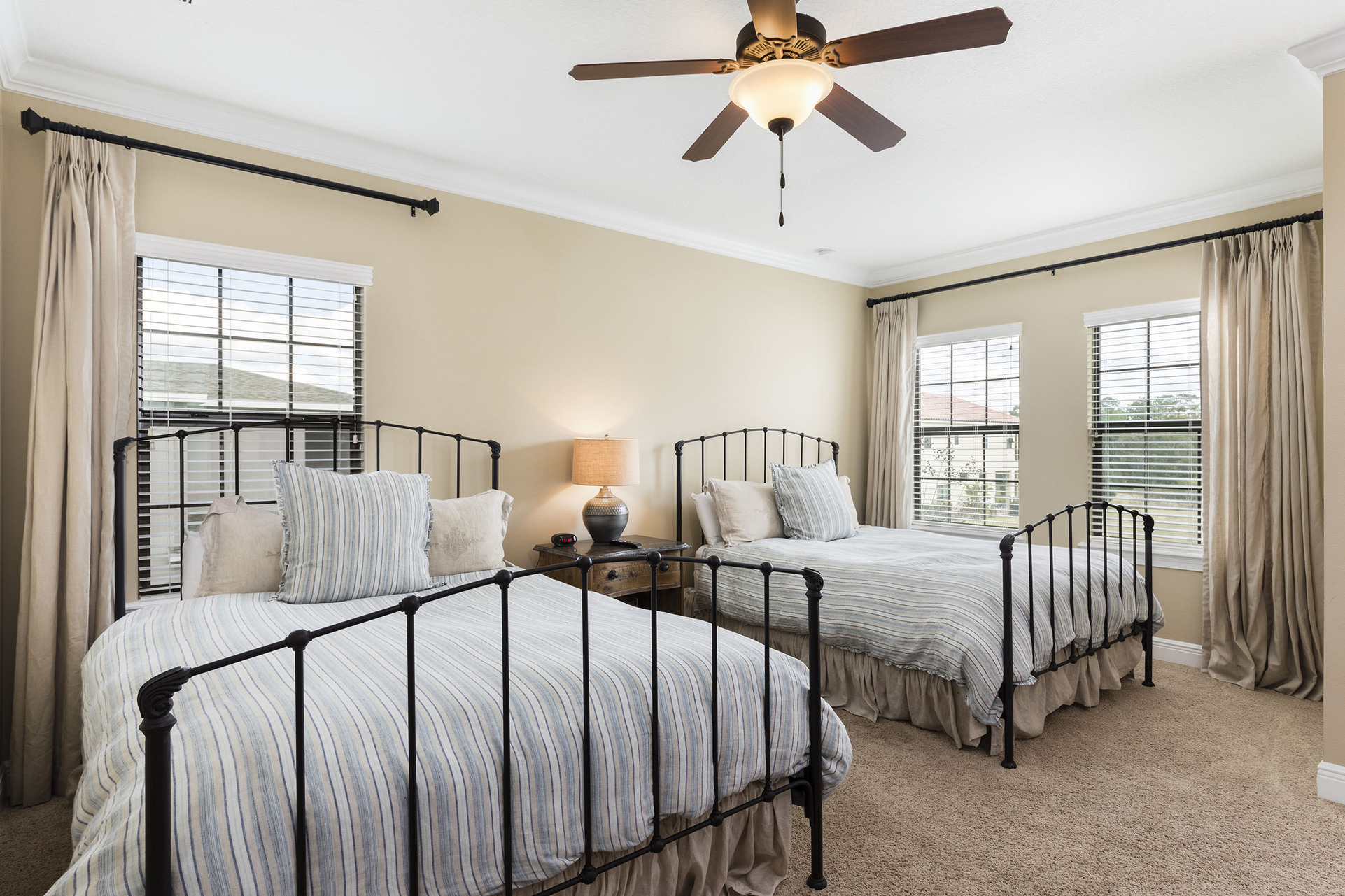 The 4th bedroom features 2 Queen beds and private bathroom