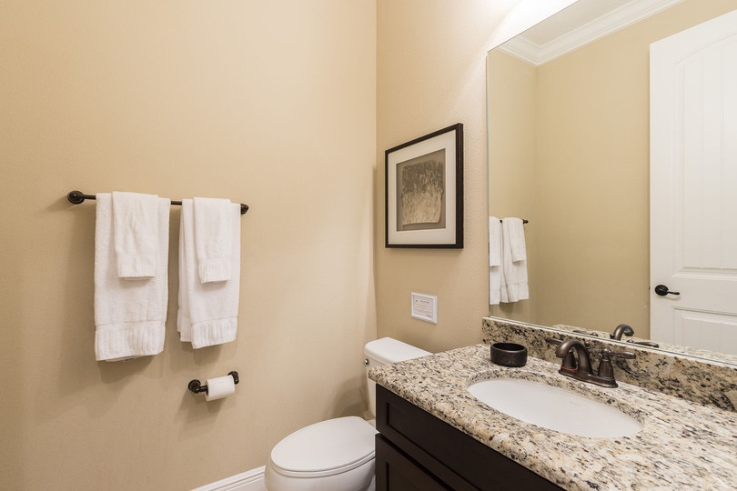 The half bathroom is located on the ground floor