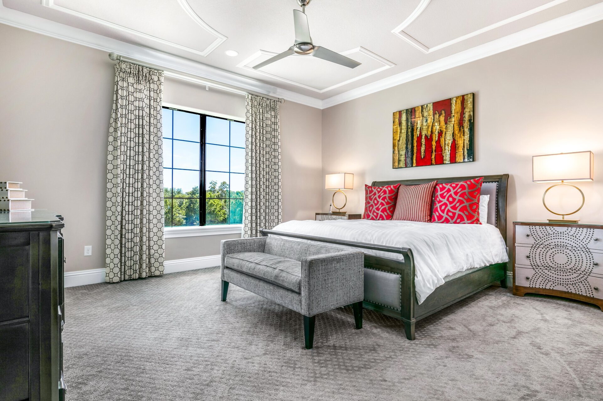 A master suite located on the second floor with a king size bed