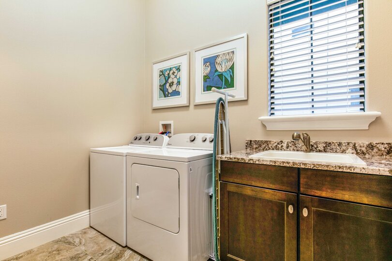There is another laundry room located in the second floor