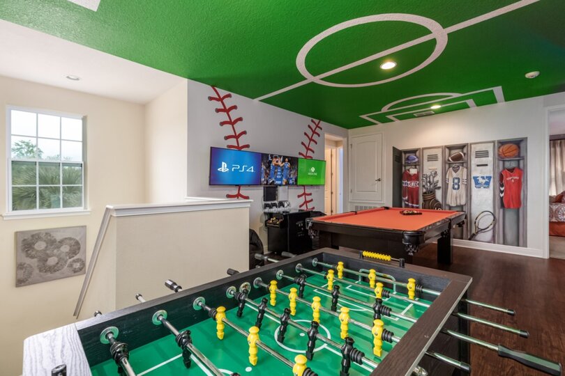Head upstairs to the fun sports themed loft game room