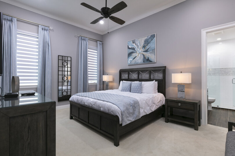 Stretch out on this king-sized bed after a day of exploring Orlando attractions