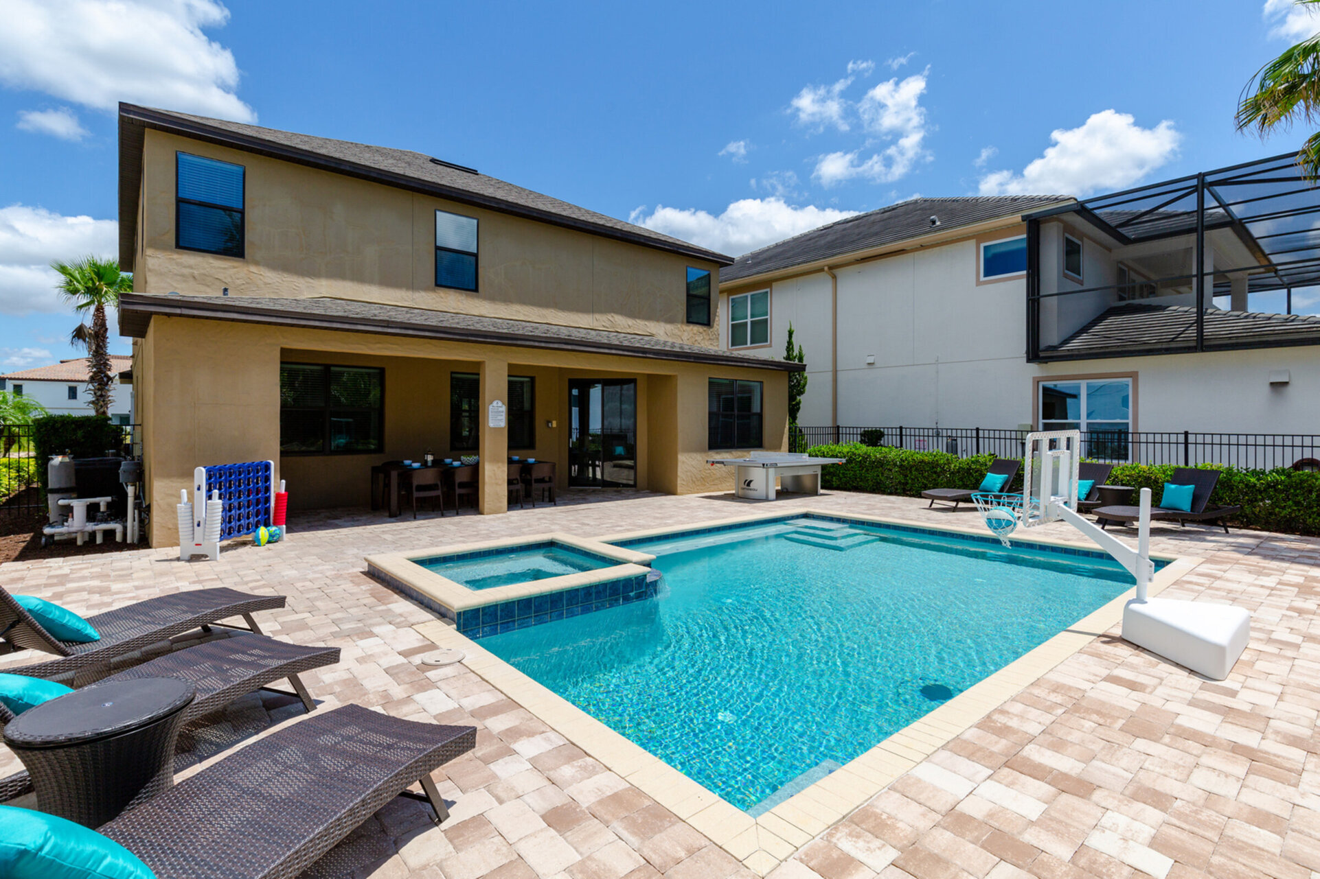 Lounge in the sun or enjoy the pool with spillover spa