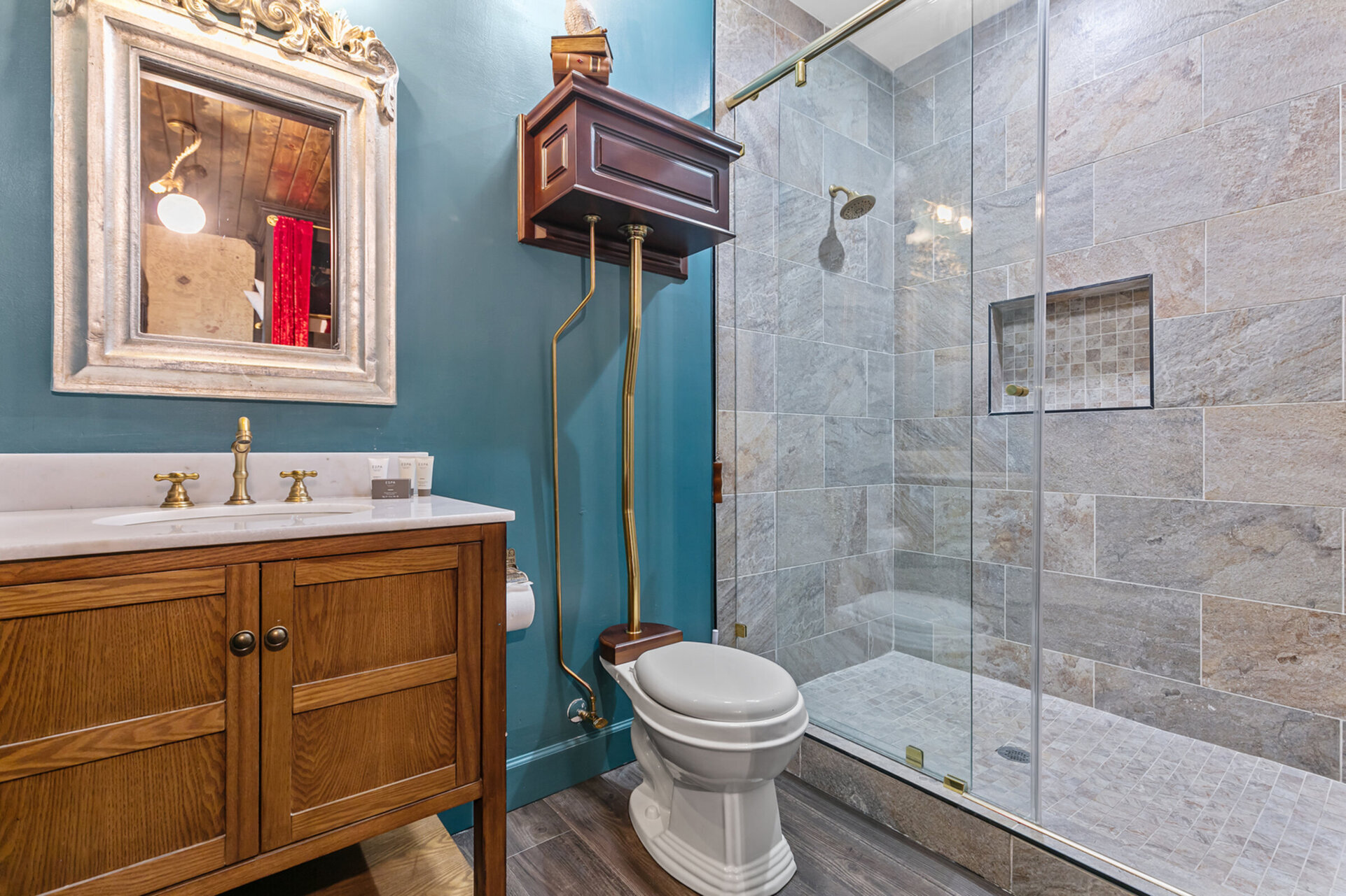 En-suite bathroom features a walk in shower.