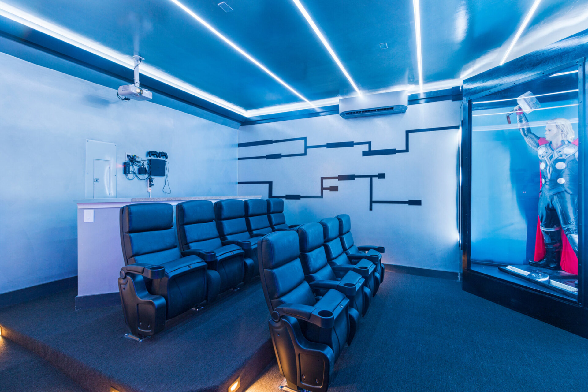 Featuring 9 comfortable recliners, 4 seats at the bar, a 120 inch movie screen, Apple TV 2 and PS4