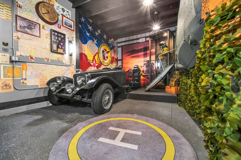 1930s SS Jaguar with a racing simulator and 2 PlayStation 5