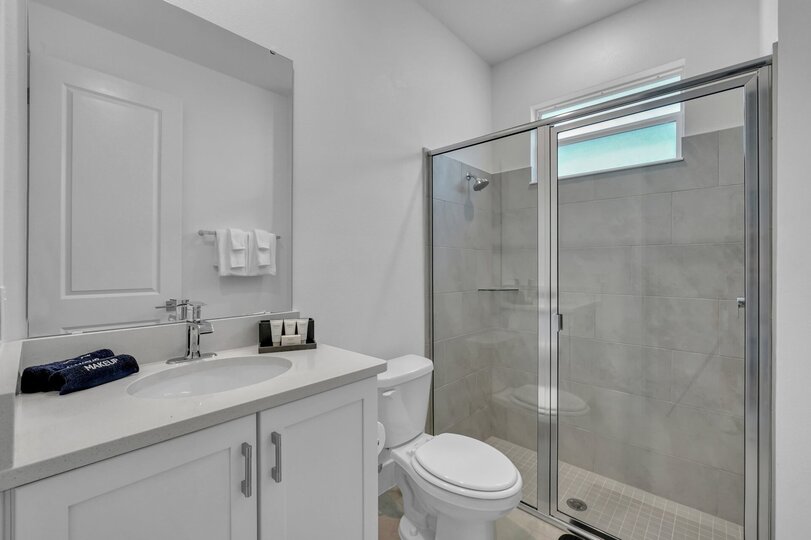 Enjoy the convenience of an en-suite bathroom featuring a walk-in shower for a refreshing start to your day