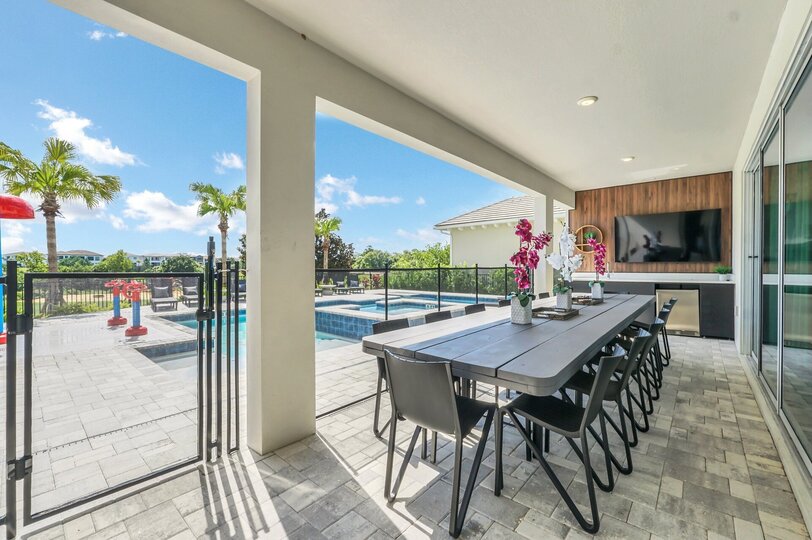 Dine al fresco under the covered lanai with seating for 12