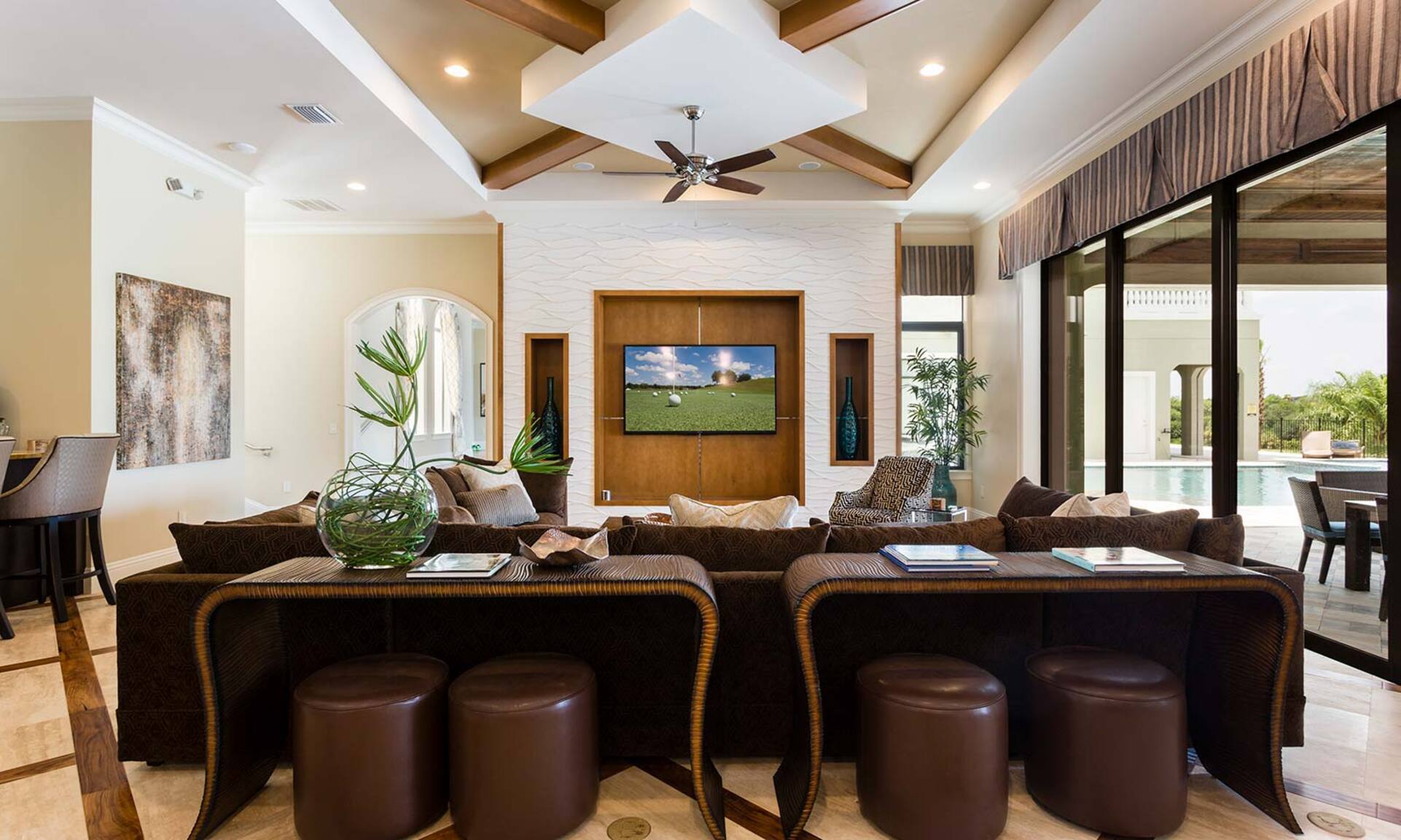 This modern themed living area features a fantastic open concept floorplan perfect for the larger group vacations