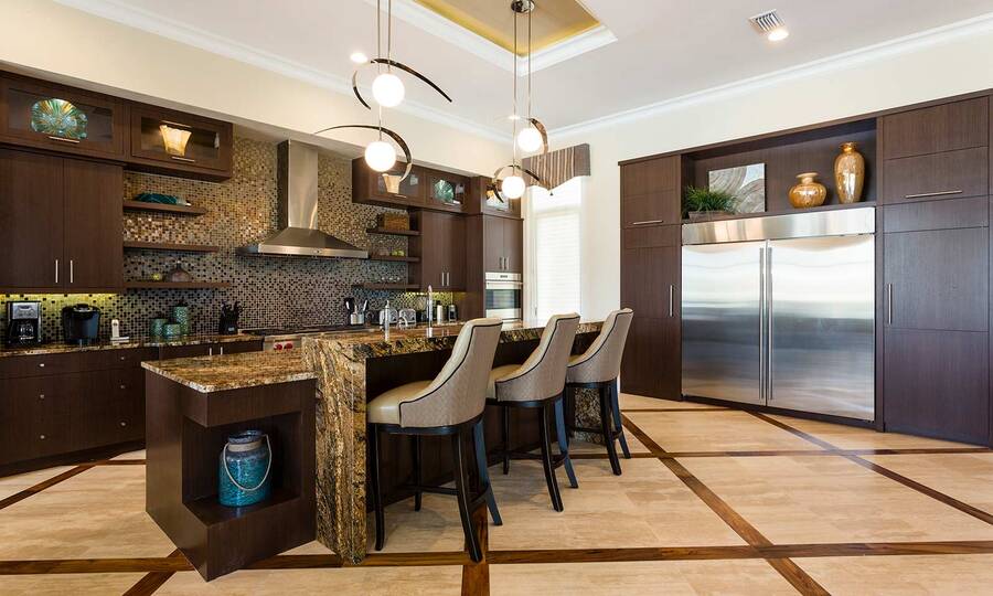 Sit down at the bar top whilst the family cooks up some home cooked meals