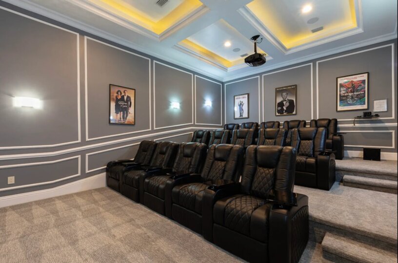 Complete with plush reclining chairs and state-of-the-art surround sound for an immersive cinematic experience.