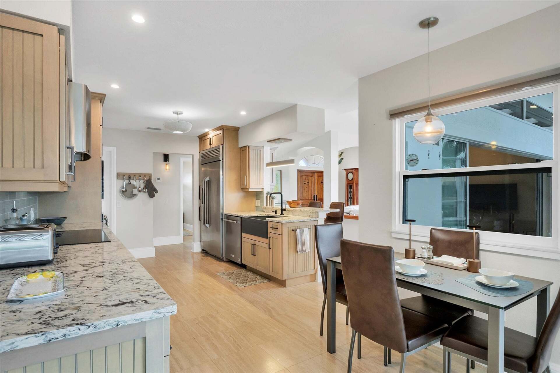 Beautiful, bright, fully-equipped kitchen. Kitchen nook table seats 4 and overlooks pool and canal
