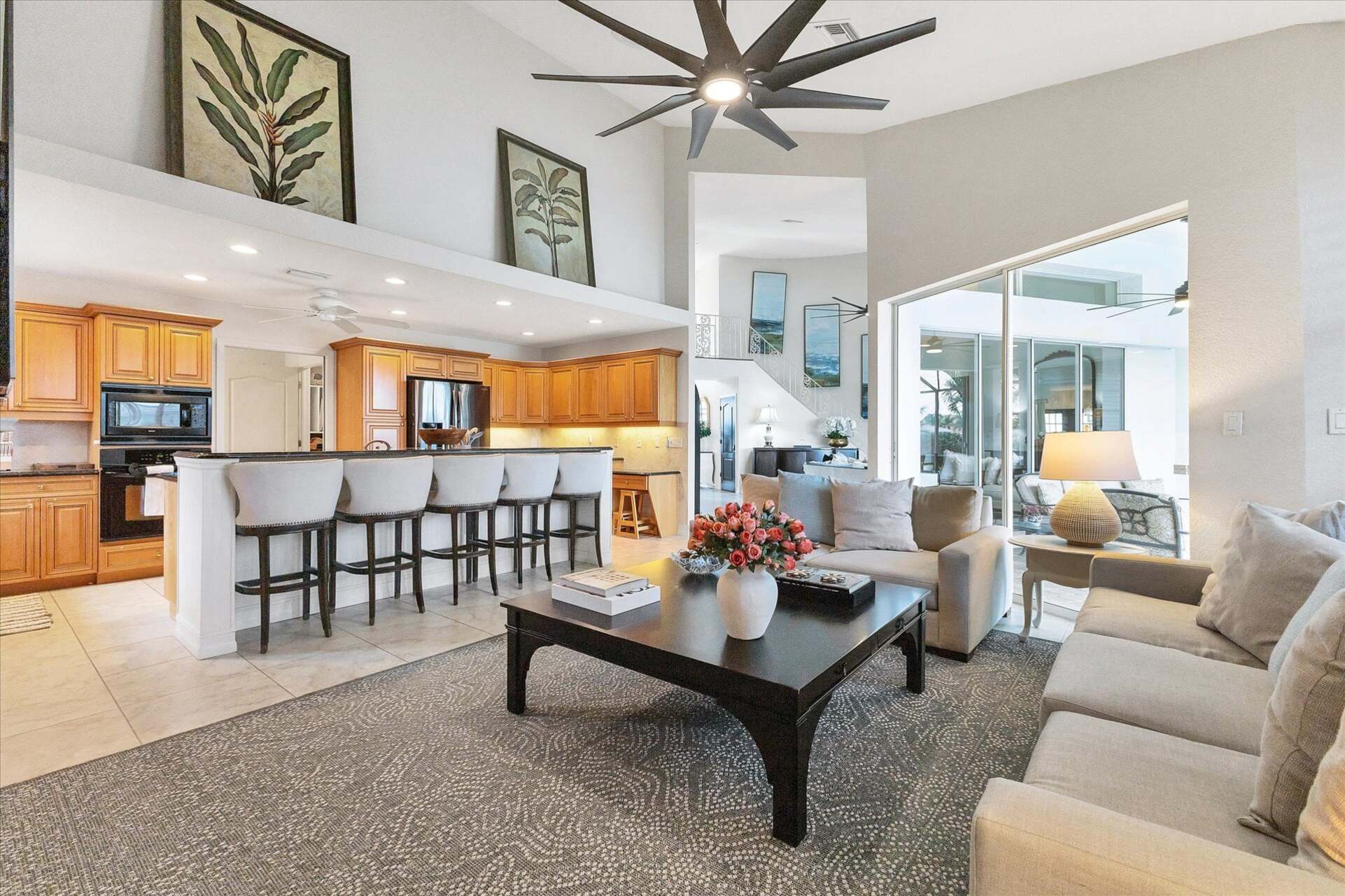 Comfy, Bright Living Room with Electric Fireplace and 65" Smart TV
