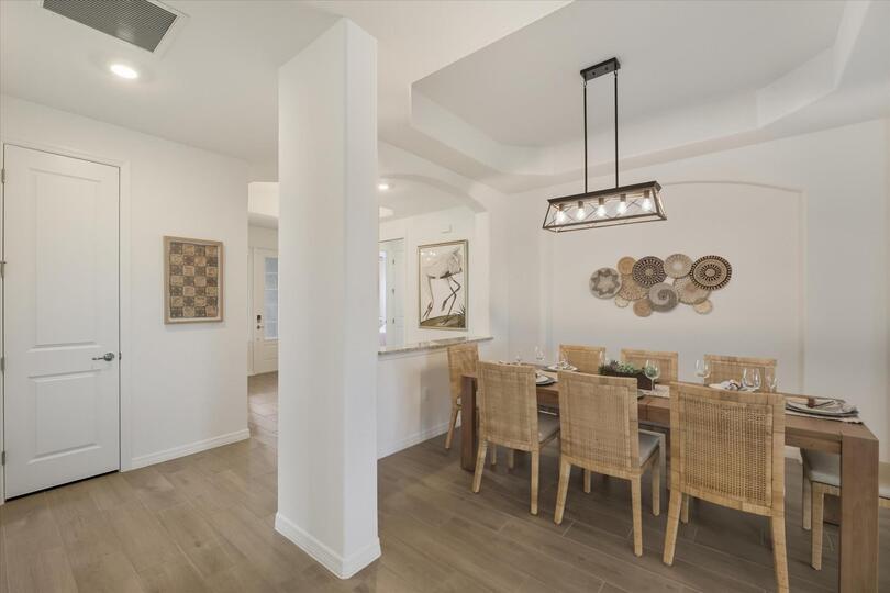 Dining area. Dining table seats 8with additional seating for 4 at the kitchen island