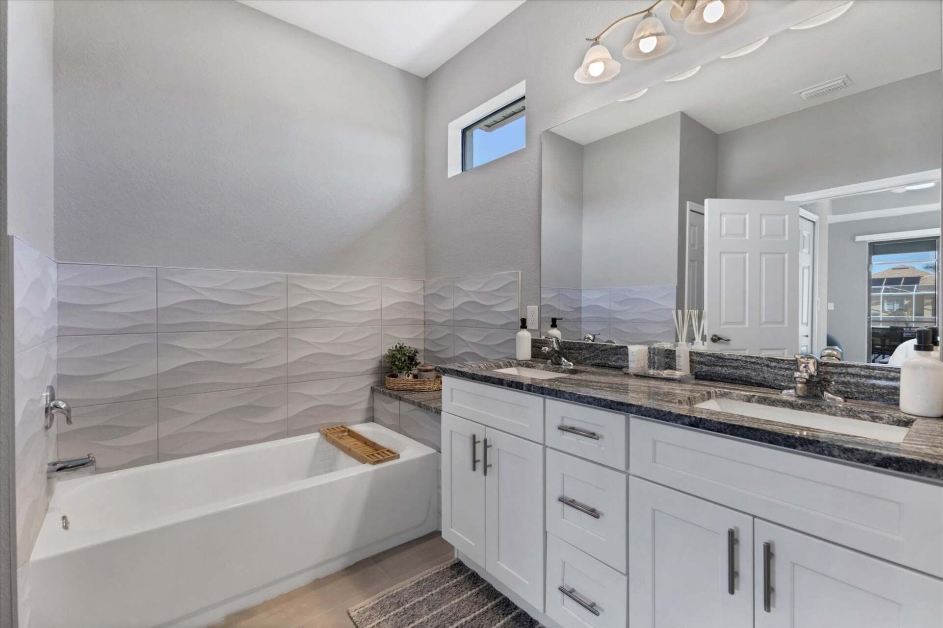 Primary bathroom with walk-in shower, soaking tub and double vanities