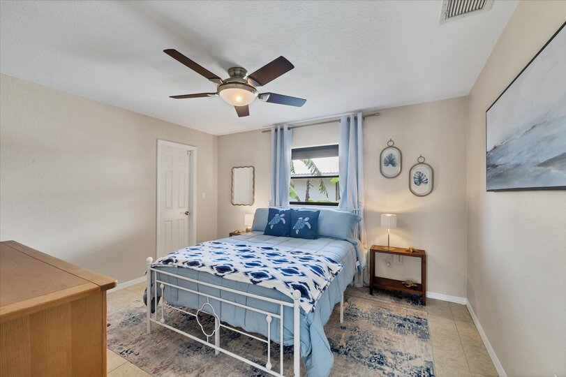Guest Bedroom with Queen Bed and 32" Smart TV