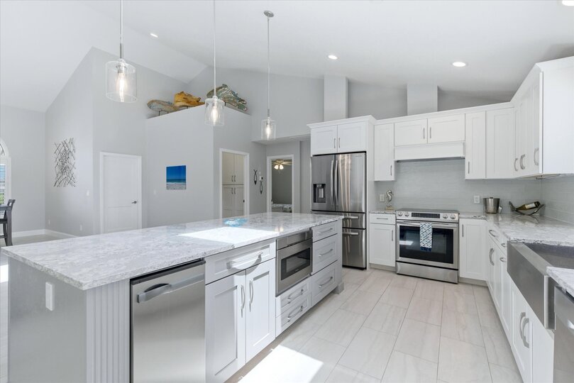 Beautiful, bright, fully-equipped kitchen with huge pass-through window