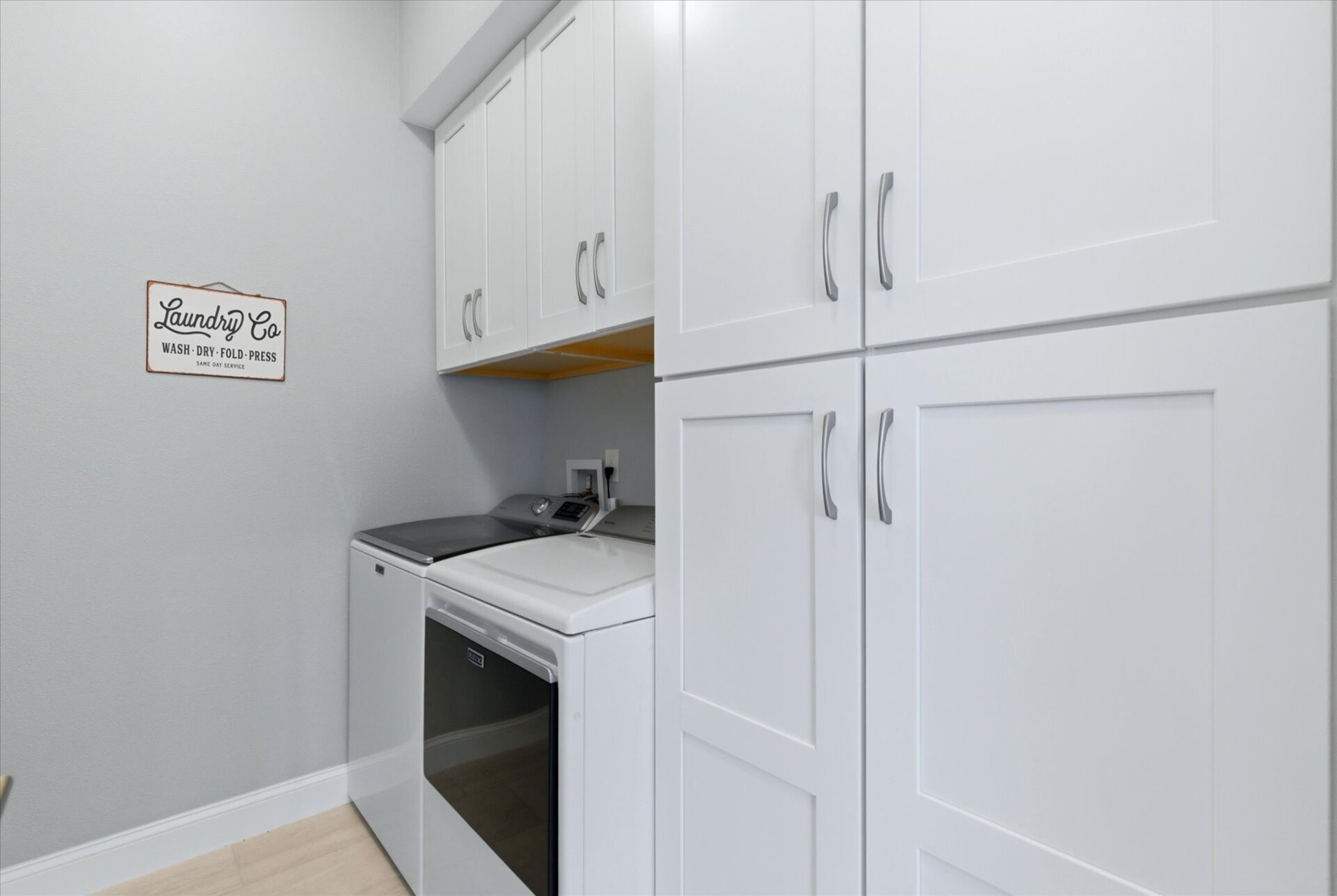 Laundry room with full-size washer & dryer
